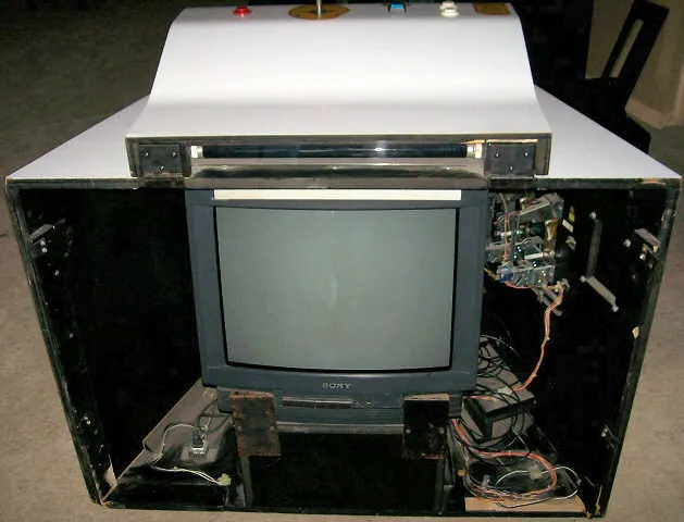 A warmly lit arcade cabinet ready for play